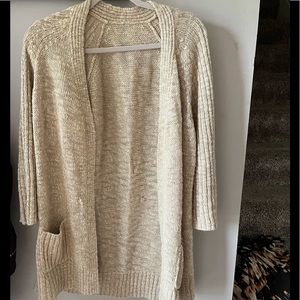 Cream sweater.